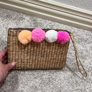 Pom Pom Woven Wristlet Clutch
